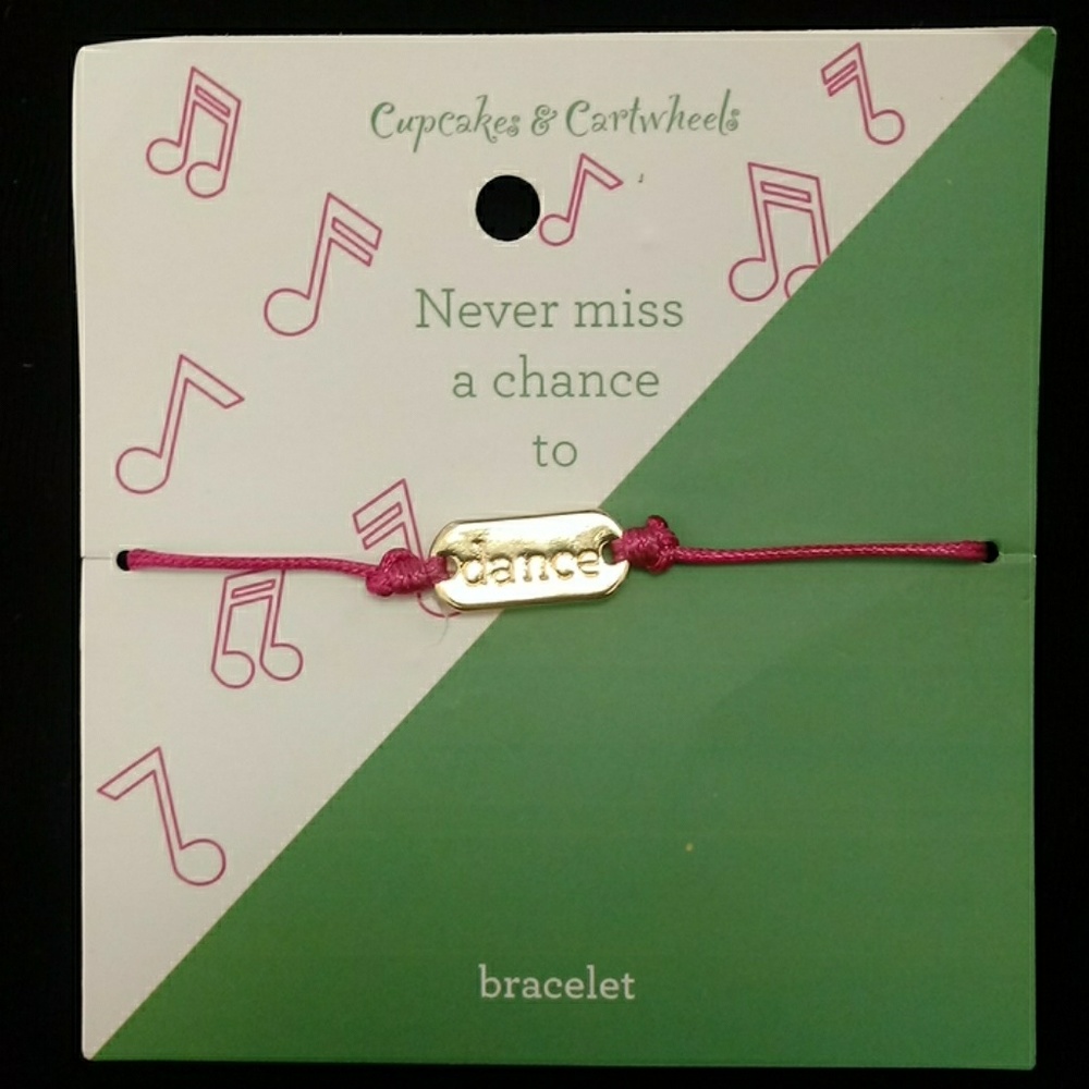 Pink band and Gold emblem labeled "dance"